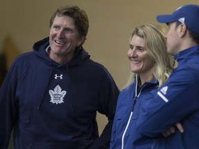 Toronto Maple Leafs head coach Mike Babcock and Hayley Wickenheiser between periods as the Toronto Maple Leafs hold their Development Camp Scrimmage at the MasterCard Centre in Etobicoke on June 28, 2018. Stan Behal/Toronto Sun