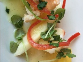 A light and artistically plated appetizer of lobster with vanilla sauce in Luminae, a restaurant for suite guests cruising aboard the Celebrity Summit. ROBIN ROBINSON/POSTMEDIA NETWORK