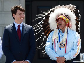 Prime Minister Justin Trudeau and Perry Bellegarde, national chief of the Assembly of First Nations, celebrate National Indigenous Peoples Day in Ottawa on June 21, 2017. THE CANADIAN PRESS/Sean Kilpatrick