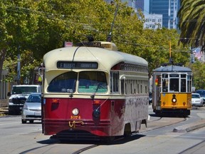 San Francisco's historic Market Street Railway pays tribute to streetcars from around the world. The MSR fleet includes this vintage TTC look-alike seen at 17th and Noe St., followed by a 1928 tram from Milan, Italy.