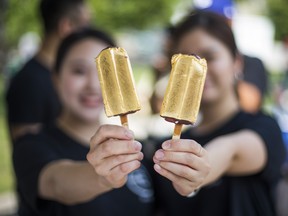 Gold Ice Cream, by Eative - an ice-cream bar covered in 24 karat edible gold foil at the CNE Media Preview at Exhibition Place in Toronto, Ont. on Wednesday August 15, 2018. The Canadian National Exhibition runs from August 17 to September 3. Ernest Doroszuk/Toronto Sun/Postmedia