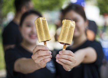 Gold Ice Cream, by Eative - an ice-cream bar covered in 24 karat edible gold foil at the CNE Media Preview at Exhibition Place in Toronto, Ont. on Wednesday August 15, 2018. The Canadian National Exhibition runs from August 17 to September 3. Ernest Doroszuk/Toronto Sun/Postmedia