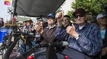 Veterans cheer on the veterans marching in the WarriorsÕ Day Parade at the CNE in Toronto, Ont. on Saturday August 18, 2018. Ernest Doroszuk/Toronto Sun/Postmedia