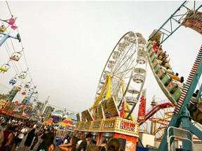 The Ferris Wheel, the Sky Ride and Pharaoh's Fury are some of the classic CNE rides on Monday August 20, 2018. Veronica Henri/Toronto Sun/Postmedia Network