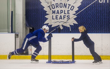 Toronto Maple Leafs Par Lindholm with skating coach Barb Underhill during a summer skate at the MasterCard Centre in Toronto, Ont. on Monday August 27, 2018. Ernest Doroszuk/Toronto Sun