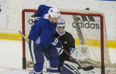 Toronto Maple Leafs Connor Brown and goalie Curtis McElhinney during a summer skate at the MasterCard Centre in Toronto, Ont. on Tuesday August 28, 2018. Ernest Doroszuk/Toronto Sun/Postmedia