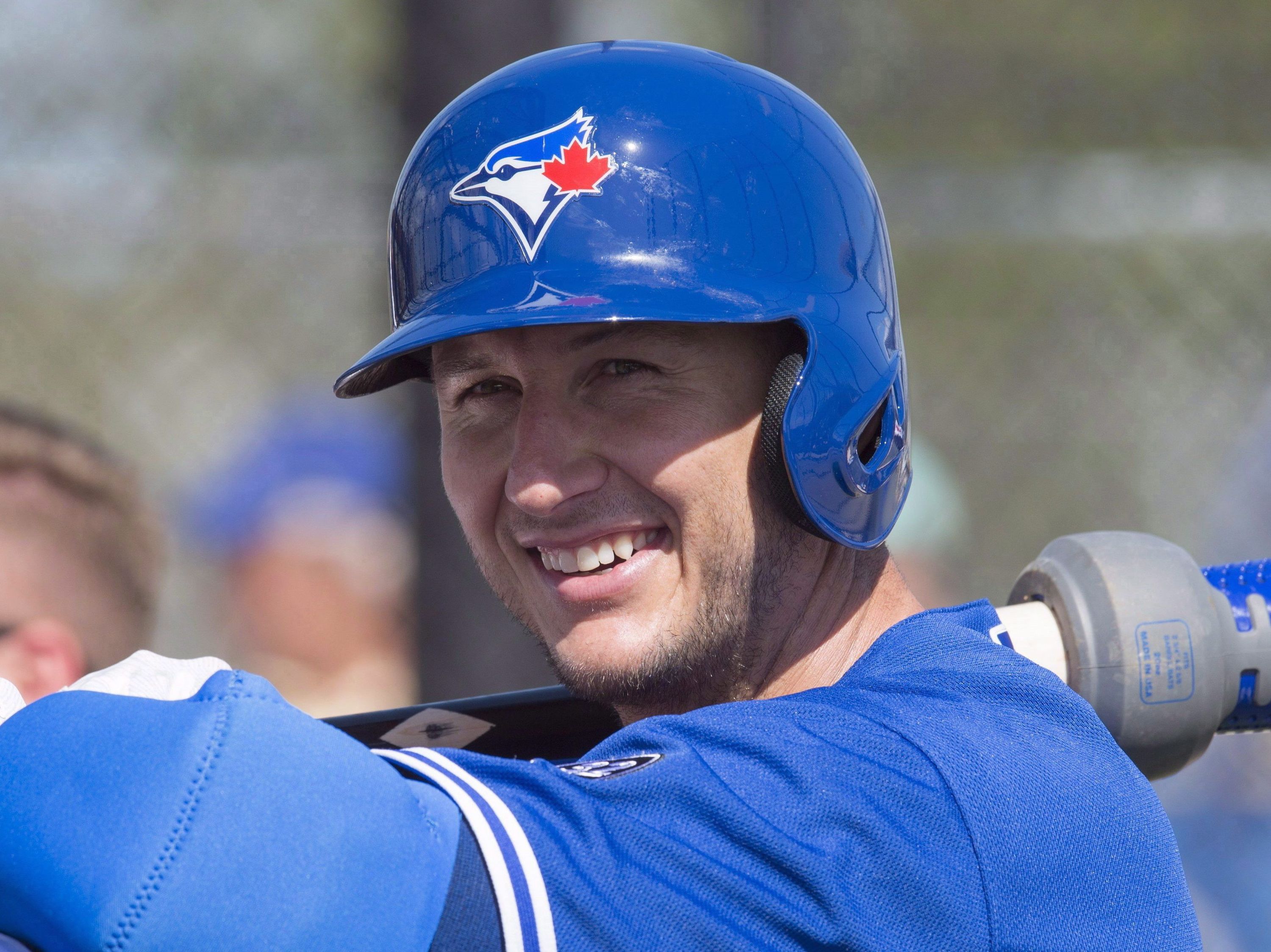 Troy Tulowitzki poses as a pitcher on Blue Jays' photo day