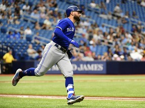 Blue Jays' Kevin Pillar hits a single against the Tampa Bay Rays on Sunday. (GETTY IMAGES)