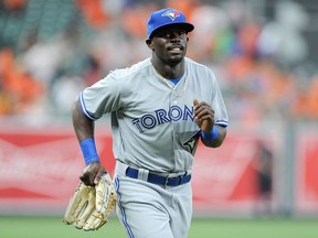 Anthony Alford #30 of the Toronto Blue Jays warms up before his MLB debut against the Baltimore Orioles at Oriole Park at Camden Yards on May 19, 2017 in Baltimore, Maryland.