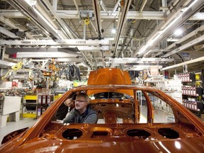 Workers at the Chrysler assembly plant in Brampton, Ont.  (Canadian Press file)
