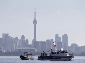 Toronto Police Marine Unit look for the body of a scuba diver in Lake Ontario on Monday, Sept. 17, 2018. (Ernest Doroszuk/Toronto Sun)