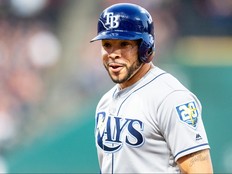 Tampa Bay Rays Tommy Pham laughs at his teammates in the dugout while on first base during the fourth inning against the Cleveland Indians at Progressive Field on August 31, 2018 in Cleveland, Ohio. (Jason Miller/Getty Images)