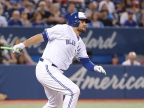 Rowdy Tellez #68 of the Toronto Blue Jays hits a double in the eighth inning during MLB game action against the Cleveland Indians at Rogers Centre on September 6, 2018 in Toronto, Canada. (Photo by Tom Szczerbowski/Getty Images)