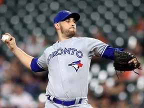 Starting pitcher Marco Estrada #25 of the Toronto Blue Jays throws to a Baltimore Orioles batter in the first inning at Oriole Park at Camden Yards on September 19, 2018 in Baltimore, Maryland.