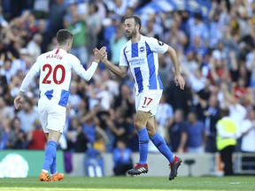 Brighton & Hove Albion's Glenn Murray (right) has been an absolute bargain for the Gulls. (AP)