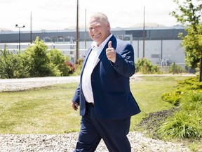 Premier Doug Ford is pictured on June 21, 2018, after he committed to keeping the Pickering Nuclear Generating Station in operation until 2024. (The Canadian Press)