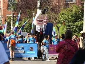 Toronto's annual Labour Day Parade wove its way from City Hall to Lamport Stadium on Monday. (Jack Boland, Toronto Sun)