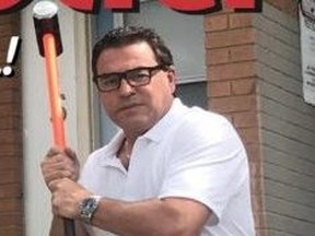 Councillor Giorgio Mammoliti holds a sledgehammer in his re-election ad. His ad says it's time to demolish social housing buildings in his ward.