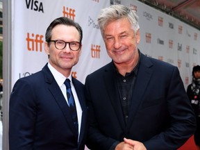 Christian Slater (L) and Alec Baldwin attend the "The Public" premiere during 2018 Toronto International Film Festival at Roy Thomson Hall on Sept. 9, 2018. (Photo by GP Images/Getty Images