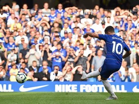 Chelsea's Eden Hazard scored on a penalty during Saturday's game against Cardiff. (GETTY IMAGES)