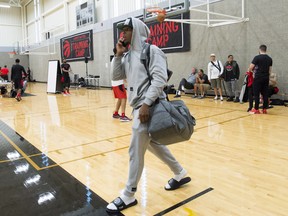 Raptors' Kyle Lowry walks off the court after practice on Thursday. (THE CANADIAN PRESS)