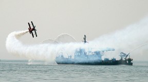 Mike Wiskus in his bright orange Pitts takes to the sky during the 69th annual Canadian International Air Show (CIAS)in Toronto on Saturday September 1, 2018. (Dave Abel/Toronto Sun/Postmedia Network)
