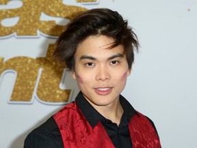 Magician Shin Lim arrives at the "America's Got Talent" Season 13 Week 4 red carpet at the Dolby Theatre on Tuesday, Sept. 4, 2018, in Los Angeles. (Willy Sanjuan/Invision/AP)