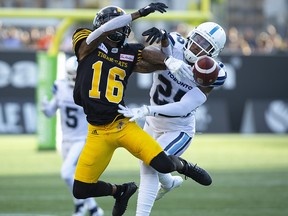 Hamilton Tiger-Cats wide receiver Brandon Banks (16) fails to make the catch while defended by Toronto Argonauts defensive back Ronnie Yell (25) in Hamilton on Monday, September 3, 2018. (THE CANADIAN PRESS/Peter Power)