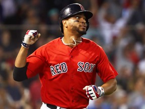 Xander Bogaerts of the Boston Red Sox reacts after hitting a solo home run in the fourth inning of a game against the Houston Astros at Fenway Park on Sept. 7, 2018 in Boston, Massachusetts.  (ADAM GLANZMAN/Getty Images)