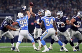 Los Angeles Chargers’ Joey Bosa left) and Melvin Ingram remain a top pass-rushing tandem. GETTY IMAGES