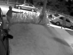 This image was taken from surveillance video which shows a gunman firing on the front lawn of an East York home on Sept. 14.