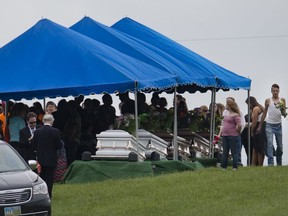 Eight members of the Rhoden family, murdered in 2016, are laid to rest. THE ASSOCIATED PRESS