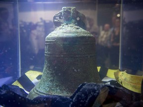 The ship's bell from the recently discovered Franklin Expedition shipwreck HMS Erebus sits in pure water after being recovered in Ottawa on Thursday, Nov. 6, 2014.Canadian archeologists will spend two weeks exploring the wreck of the HMS Erebus to uncover even more secrets from the ill-fated Franklin expedition. The ship, along with the HMS Terror, disappeared during an exploration through the Arctic in 1846, leaving the fate of captain Sir John Franklin and his crew a mystery for more than 150 years.
