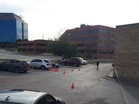 Investigators at the scene of a shooting behind a plaza at 3850 Steeles Ave. W. in Vaughan on Sept. 21, 2018. (YRP/Twitter)