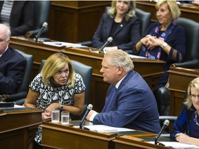 Ontario Premier Doug Ford and Deputy Premier Christine Elliott during a rare Saturday session of the Legislative Assembly of Ontario at Queen's Park in Toronto, Ont. on Saturday September 15, 2018. Ernest Doroszuk/Toronto Sun/Postmedia