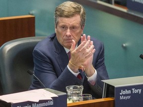 Toronto Mayor John Tory during a council meeting at city hall in Toronto, Ont. on Thursday September 13, 2018. The city voted to challenge Ontario's Bill 31 - which would shrink the size of council - in the courts.  Ernest Doroszuk/Toronto Sun/Postmedia