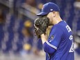 Toronto Blue Jays starting pitcher Marco Estrada looks toward the catcher before delivering during the third inning of a baseball game against the Miami Marlins, Saturday, Sept. 1, 2018, in Miami. (AP Photo/Brynn Anderson)