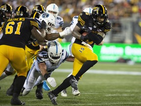 Tiger-Cats running back Alex Green racked up 115 yards on 18 carries and scored two touchdowns in a win over the Argos on Monday.  Peter Power/The Canadian Press