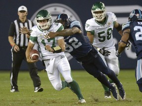 Toronto Argonauts' Troy Davis (92) tackles Saskatchewan Roughriders quarterback Zach Collaros (17) during second half CFL action on Saturday THE CANADIAN PRESS/Jon Blacker jcb113