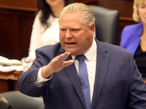 Premier Doug Ford speaks during question period after announcing his government will seek to create a select committee to investigate Liberal waste and scandal at Queen's Park in Toronto, Ont. on Monday September 24, 2018. Dave Abel/Toronto Sun/Postmedia Network