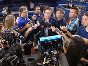 In this file photo, Toronto Blue Jays general manager Ross Atkins the  speaks to members of the media before the start of MLB game action against the Detroit Tigers at Rogers Centre on June 29, 2018 in Toronto. (Tom Szczerbowski/Getty Images)