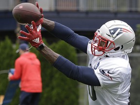 New England Patriots wide receiver Josh Gordon catches the ball during an NFL football practice, Wednesday, Sept. 19, 2018, in Foxborough, Mass. (AP Photo/Steven Senne) ORG XMIT: MASR109