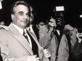 Mob boss John Gotti after another court win in the late 1980s. His daughter says the Dapper Don wanted nemesis Rudy Giuliani to run for president. THE ASSOCIATED PRESS