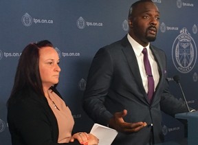 Evelyn Fox pleaded for help solving the 2016 murder of her son Kiesingar Gunn, 26, as Homicide Det. Leslie Dunkley announced a $50,000 reward during a news conference at Toronto Police Headquarters on Tuesday, Sept. 11, 2016. (Chris Doucette/Toronto Sun/Postmedia Network)