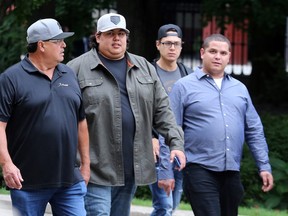 Businessman Ken Hill enters court on Monday to hear arguments in his child support dispute with former partner Brittany Beaver. (Dave Abel/Toronto sun)