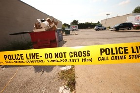 Toronto’s 78th homicide scene behind a plaza at 4559 Sheppard Ave. E. east of Brimley Rd., on Wednesday, September 19, 2018. Jack Boland/Toronto Sun