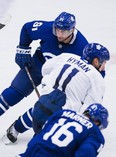 From left: Leafs John Tavares, Zach Hyman and Mitch Marner take part in a skating drill at training camp in Niagara Falls, Ont. over the weekend.(The Canadian Press)