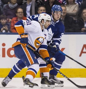 Former Isles captain John Tavares (left) and Leafs forward Auston Matthews jostle in a 2017 game. CRAIG ROBERTSON/SUN FILE