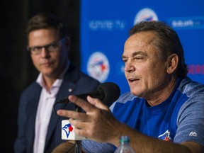 Toronto Blue Jays manager John Gibbons (right) is joined by general manager Ross Atkins as he addresses media before the game against the Houston Astros at the Rogers Centre in Toronto, Ont. on Wednesday September 26, 2018.  Ernest Doroszuk/Toronto Sun