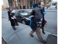 Joshua Boyle, his wife, Caitlan Boyle and their three children are seen walking up Elgin Street last October.